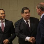 Hadri smiling with Minister