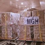 MGH operated cargo loaded on a weekly freighter