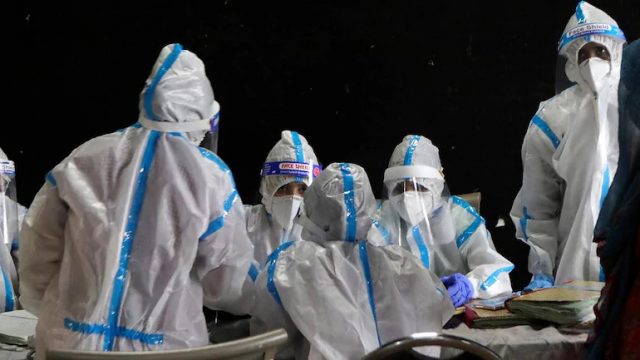 Healthcare frontliners at work. | Source: AIDS Healthcare Foundation