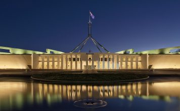 Blue hour photo of Parliament House, Canberra, Australia. This image is a HDR composite, stitched from four different exposures. 7 April 2017. | Photo by Thennicke - Own work, CC BY-SA 4.0, https://commons.wikimedia.org/w/index.php?curid=57886437