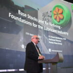 Dr. H. Ernest Henderson delivering his presentation on the advantages of re-refined base oil.