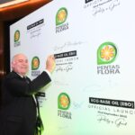 Dr. H. Ernest Henderson, flown in all the way from the United States of America proudly signing his name to a memorable event.