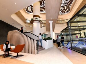 A centrepiece staircase called “Tree of Knowledge” that can change ambience lighting, a 220-inch video wall and built-in sound system provide physical, visual and audio stimulus to enhance the emotional engagement of Catapult’s learners. | Catapult, Rochester Commons, Singapore. 2 Nov 2022. | Photo by CapitaLand/NHA File Photo