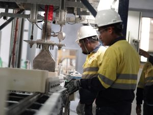Three Lynas Malaysia employees at work in the rare earth plant in Gebeng Industrial Park, Kuantan, Pahang.