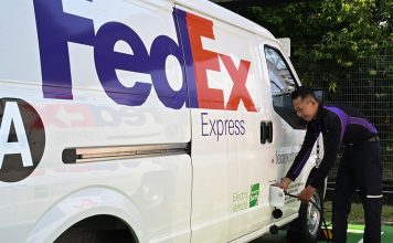 FedEx Express employee charging the newly launched FedEx Express electric vehicle (EV) in Malaysia. | Photo by FedEx/NHA File Photo