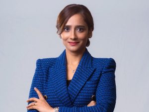 A corporate portrait of Dzuleira Abu Bakar, CEO of MRANTI, wearing a dark blue tweed suit. | Photo by MRANTI/NHA File Photo