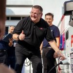 Photo 2 – Charles Brewer, Group Chief Executive Officer of Pos Malaysia Berhad trying out one of the EV charging station_r