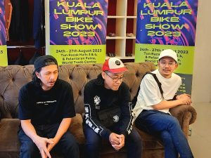 Three of the members of indie rock band, Hujan, being interviewed by Anindya Arif for News Hub Asia (NHA) at the exclusive media event by the Kuala Lumpur Bike Show 2023 at Bon Zainal Boutique in Plaza Damas, Hartamas, Kuala Lumpur. | Photo by Ruzanna Muhammad/NHA File Photo
