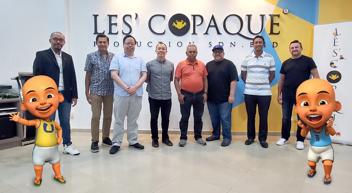 Team TMG Ventures with Team Les’ Copaque at the latter’s headquarters in Shah Alam, Selangor, Malaysia. Hj. Burhanuddin Mohd Radzi, the managing director of Les’ Copaque, in the middle, with Suhazlee bin Othman, executive director of TMG Ventures, next to him in black. | Photo by TMG Ventures/NHA File Photo