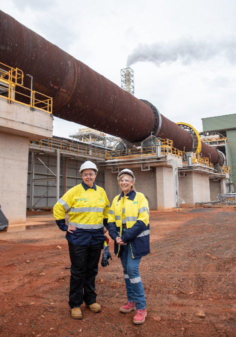 Hon. Madeleine King MP, Minister for Resources (left), and Amanda Lacaze, CEO and Managing Director, Lynas Rare Earths in front of the Kalgoorlie Rare Earths Processing Facility’s 110m long rotary kiln, one of the largest in the southern hemisphere. | Photo by Lynas / NHA File Photo