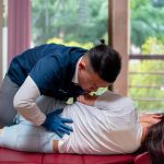 Dr Ian the Chiro treating a patient