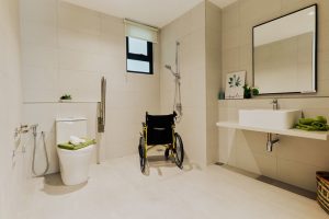 The bathroom in Type A1 is designed for accessibility and convenience, featuring a spacious layout, support rails, and wheelchair-friendly fixtures to ensure comfort and ease of use for all. | Photo by TuJu / NHA File Photo