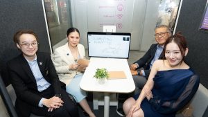 TAT Governor, Thapanee Kiatphaibool (second from left), and Kittipong Prapattong, Deputy Governor for Digitalisation, Research and Development (second from right) sittin in one of the pop-up workspaces launched on 16 December 2024 as part of the “Workation Paradise Throughout Thailand Season 2” project. | Photo by TAT Newsroom / NHA File Photo
