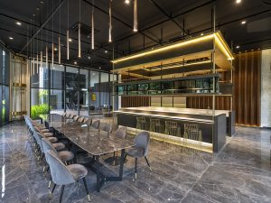 The luxurious Gourmet Kitchen and Dining Lounge at Trinity Pentamont, ideal for hostingprivate events and gatherings in style. | Photo by Trinity Group / NHA File Photo