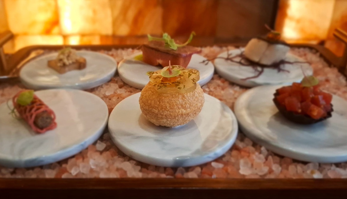Delicate starters set the tone for the experience, served on a bed of ground rock salt. | Rock Salt Restaurant, Hartamas Shopping Centre, Kuala Lumpur, Malaysia. | Photo by News Hub Asia