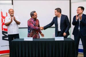 From left: Digital Minister Giving Singh Deo, MDEC CEO Anuar Fariz Fadzil, Managing Director, Member of Operations and Management Committee, CICC Capital Tong Zhong, and Managing Director, Member of the Management Committee, CICC DU Pengfei. | Kuala Lumpur, Malaysia. 19 May 2025 | Photo by Gobind Singh Deo (LinkedIn pic) / NHA File Photo