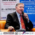 Nordin Abdullah speaking at a conference about crisis management and the modern business world (1)