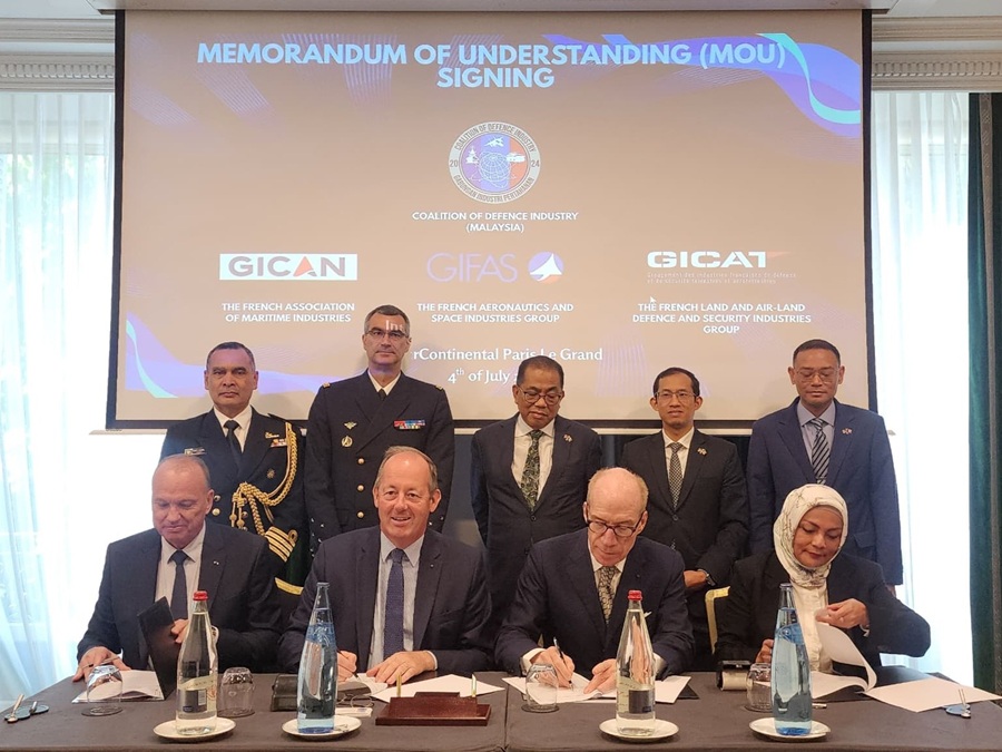 The Coalition of Defence Industry, Malaysia (CDI (M)) has signed a landmark Memorandum of Understanding (MoU) with three prominent French defence industry associations, GICAN, GICAT and GIFAS. From left: Frederic Parisot, CEO of GIFAS; Nicolas Chamussy, chairman of GICAT; Philippe Berterottière, chairman and CEO of Gaztransport & Technigaz, and Vice President of GICAN; Datuk Nonee Ashirin Binti Datuk Mohd Radzi, president of CDI (M) and GTA executive chairman. The signing was witnessed by (from left): Captain Zainol bin Ahmad RMN; Lieutenant General Gael Diaz de Tuesta; Datuk Seri Mohamed Khaled bin Nordin; Datuk Muhammad Ammir bin Haron; and Mohd Nizam bin Mohd Khir. | Paris, France. 4 July 2025. | Photo by CDI (M) / NHA File Photo