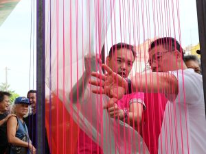 Mr Nga Kor Ming, Minister of Housing and Local Government Malaysia, explores an installation called 'ngo-kha-ki' by Ar. Quan Hwai Teng at Four Points by Sheraton, Chinatown. Drawing inspiration from the traditional five-foot way of shophouses, this installation frames past and present, echoing social interaction, climate response, and cultural continuity. | Kuala Lumpur, Malaysia. 20 July 2025 | Photo by Archidex 2025 / NHA File Photo