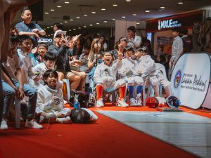 Young fencers and spectators cheering on for their team at the Negeri Sembilan Youth Challenge (NSYC), which was held in Centerpoint Seremban in Negeri Sembilan, Malaysia. 21-23 June 2025. | Photo by Negeri Sembilan Fencing Association / NHA File Photo