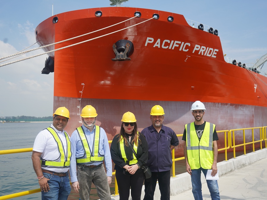 Pacific Inter-Link (PIL) representatives stand proudly in front of Pacific Pride during its inaugural berthing at Johor Port, Pasir Gudang. The moment marks a key milestone in PIL’s logistics journey, celebrating the launch of its chartered vessel - symbolising enhanced trade capabilities, greater operational control and a growing commitment to integrated global shipping solutions. From left: (from left to right) Himanshu Panchamia, director, Bulk Trading; Captain Sushmit Roy Choudhury, operation manager; Diyana Kamar, head of corporate communications; and Abdulbari Fatehi, executive, shipping. | Johor Port, Pasir Gudang, Johor, Malaysia. 3 July 2025. | Photo by Pacific Inter-Link / NHA File Photo