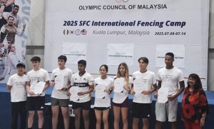 Malaysian Fencing Federation president, Rusni Abu Hassan (far right), and Taiwan's Starry Fencing Club founder, Tse-Yuan (Johnson) Chen (far left) with the top eight fencers of the 2025 SFC International Fencing Camp in Kuala Lumpur, Malaysia. 14 July 2025. | Photo by News Hub Asia