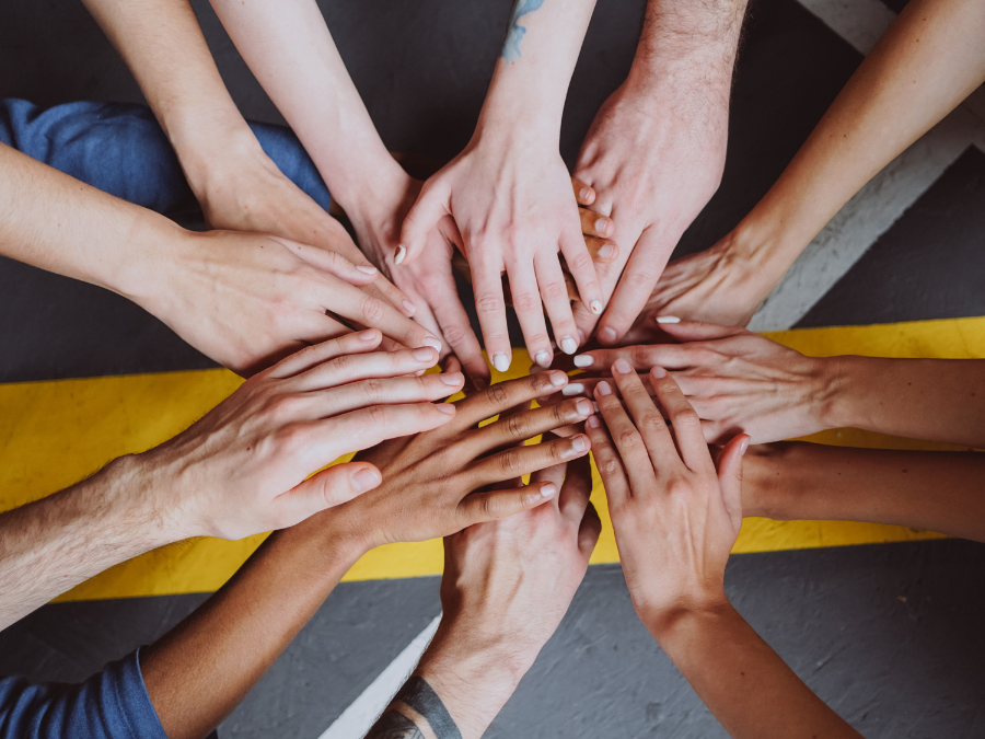 Hands together to show teamwork, cooperation, social enterprise. Photo for illustrative purposes only. | Photo by Tetiana Nekrasova / Canva / NHA File Photo