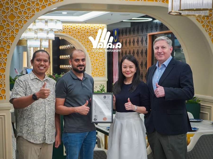 Yahala Restaurant receives the NHA Top 10 Award for the “Best Middle Eastern in Malaysia” category from NHA co-founder, Somaya Ong (centre, right), at the Yahala outlet in Taman Tun Dr Ismail, Kuala Lumpur, Malaysia. 1 October 2025 | Photo by Yahala / NHA File Photo