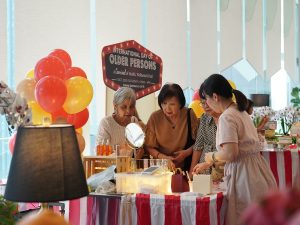 Residents engaging with exhibitors during the booth visits. | Photo by Sunway Sanctuary - October 2025 / NHA File Photo
