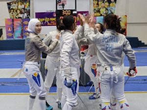 Great camaraderie and sportsmanship between the Kazakhstan and Philippines women's sabre teams at the Asian U23 Fencing Championship 2025 in Kuala Lumpur. | Kuala Lumpur, Malaysia. 22-26 October 2025 | Photo by Fencing Confederation of Asia (FCA) / NHA File Photo