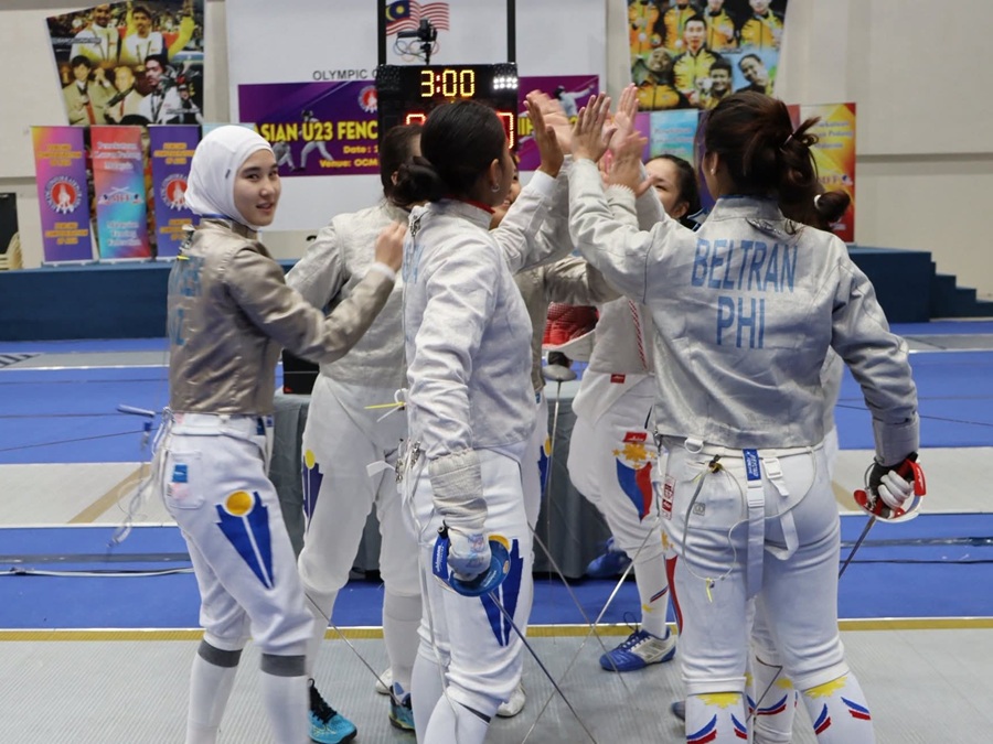 Great camaraderie and sportsmanship between the Kazakhstan and Philippines women's sabre teams at the Asian U23 Fencing Championship 2025 in Kuala Lumpur. | Kuala Lumpur, Malaysia. 22-26 October 2025 | Photo by Fencing Confederation of Asia (FCA) / NHA File Photo